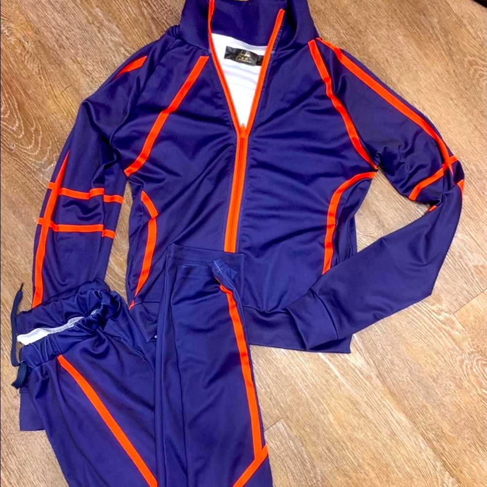 Two piece track suit .